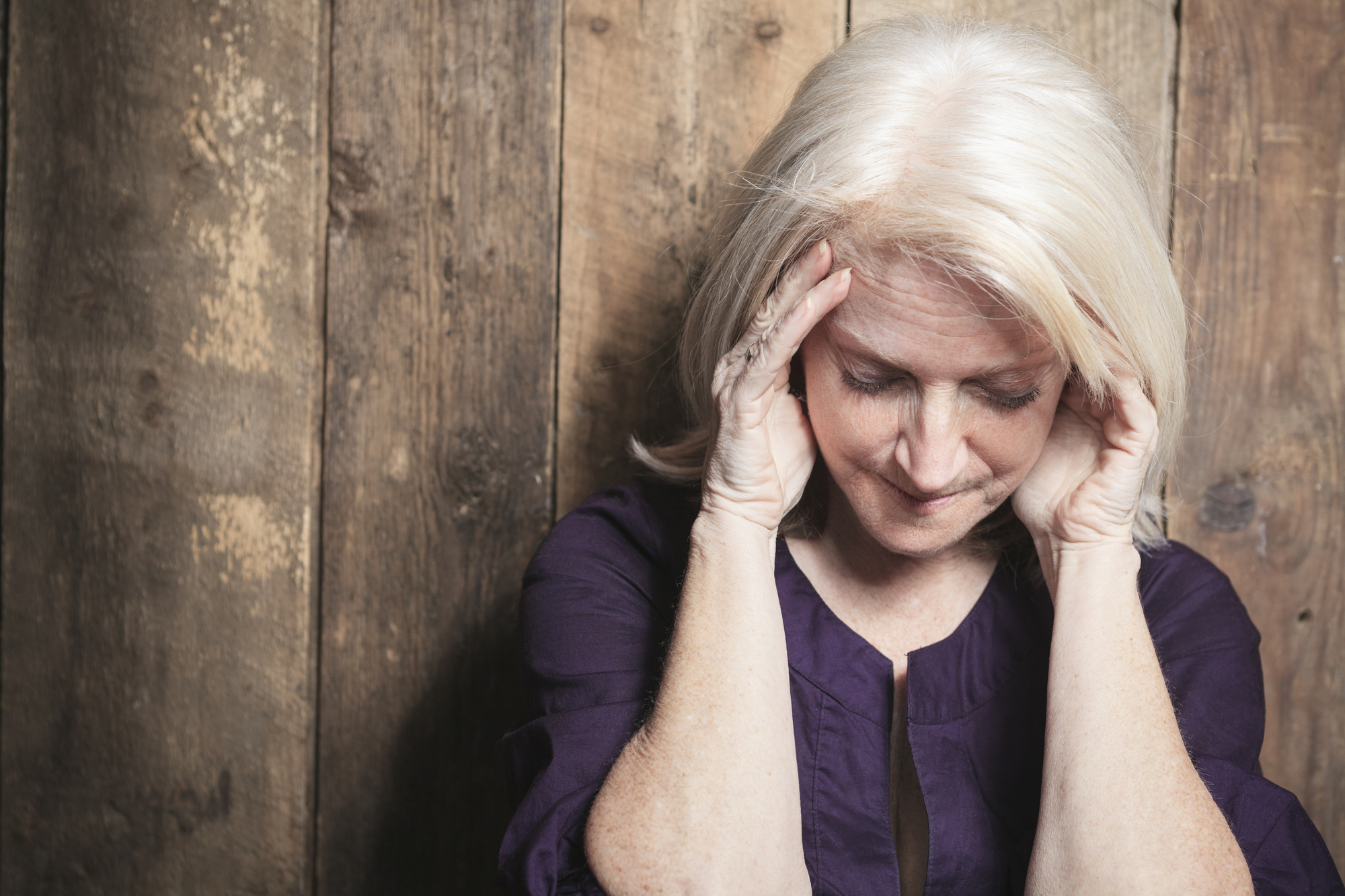 Senior person suffering menopause symptoms